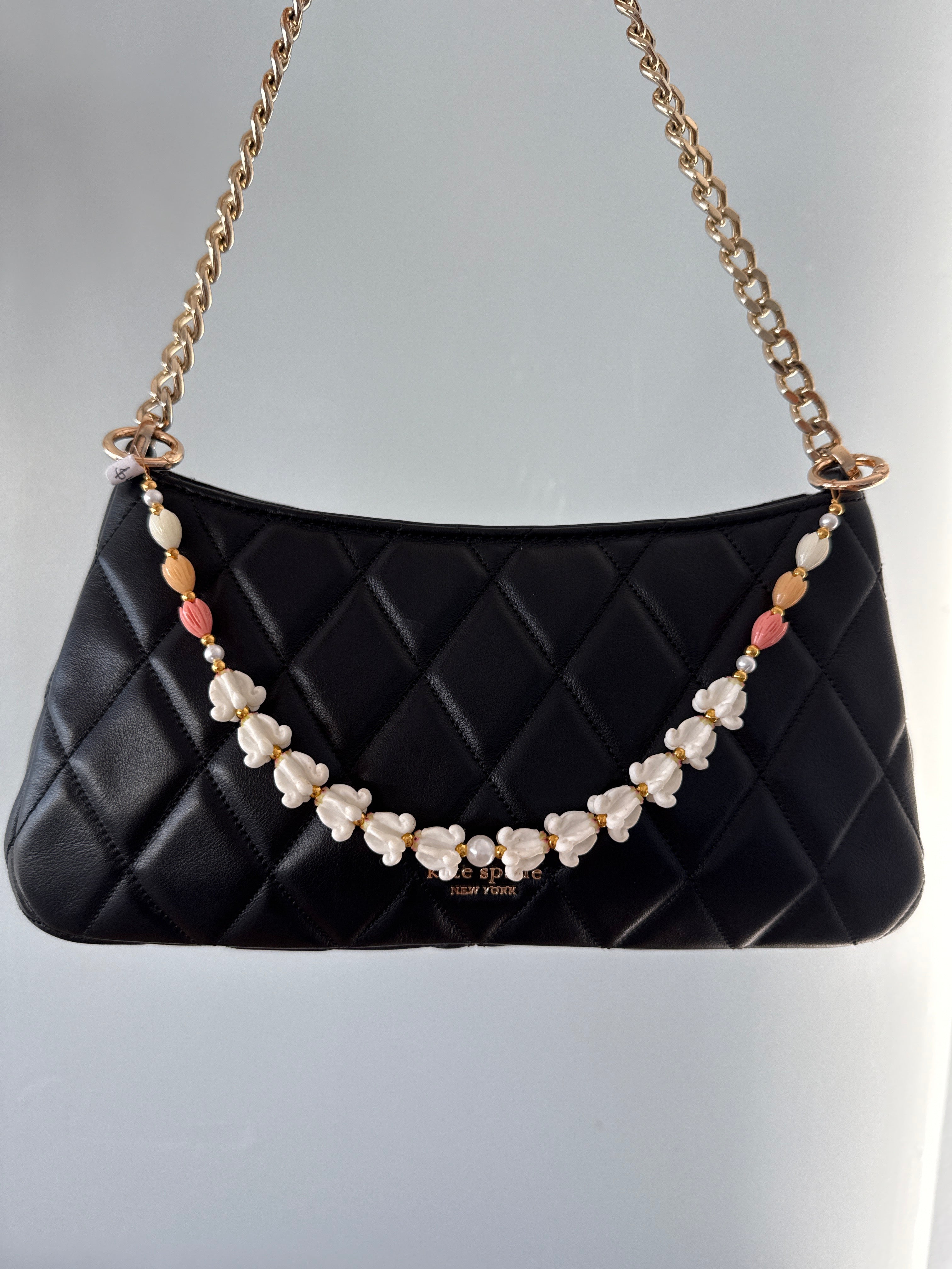 White Pua Kalaunu with Peach Rainbow Pikake