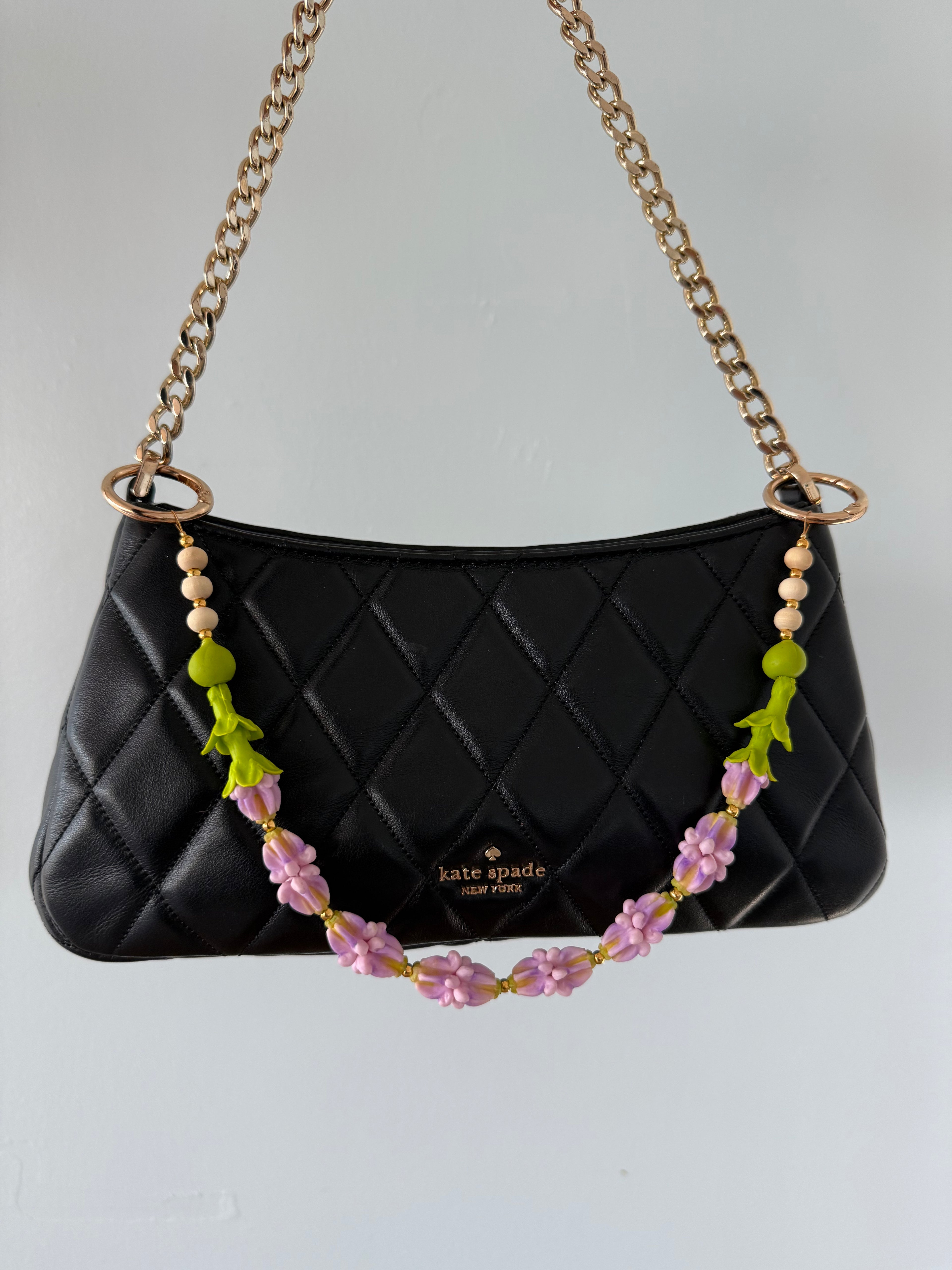 Kissing Purple Pua Kalaunu with Pakalana and Mokihana Berries